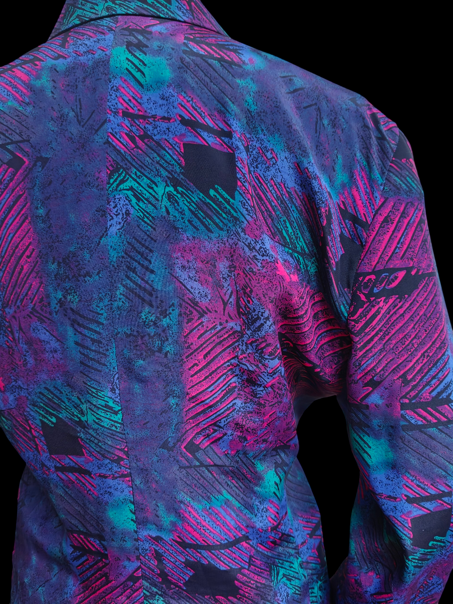 Neon patterned jacket with a black background