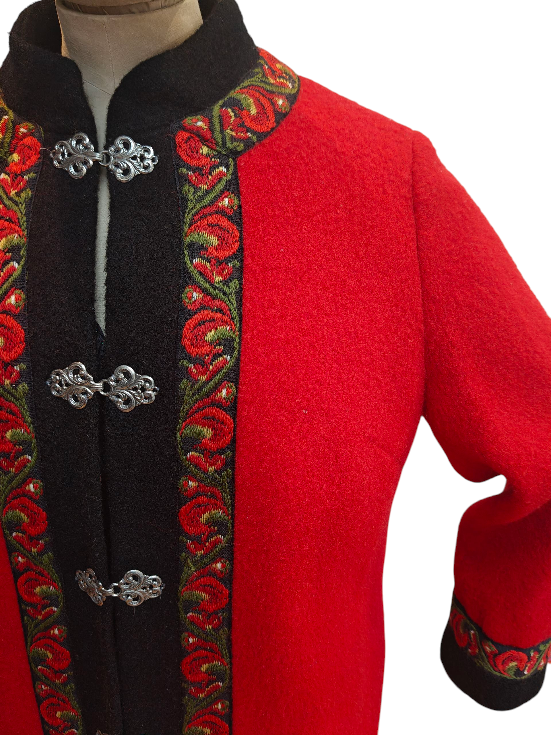 Norwegian coat with stylish metal fastenings