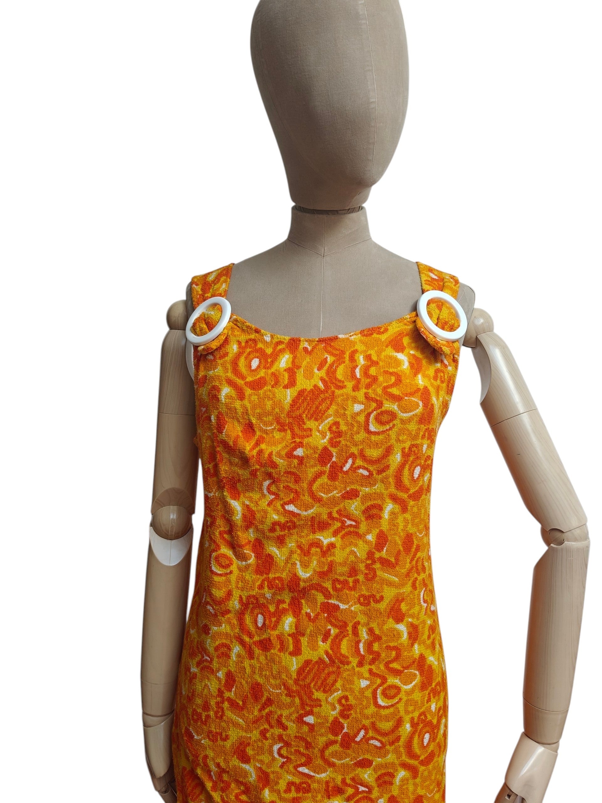 Orange and yellow swirl pattern towelling dress