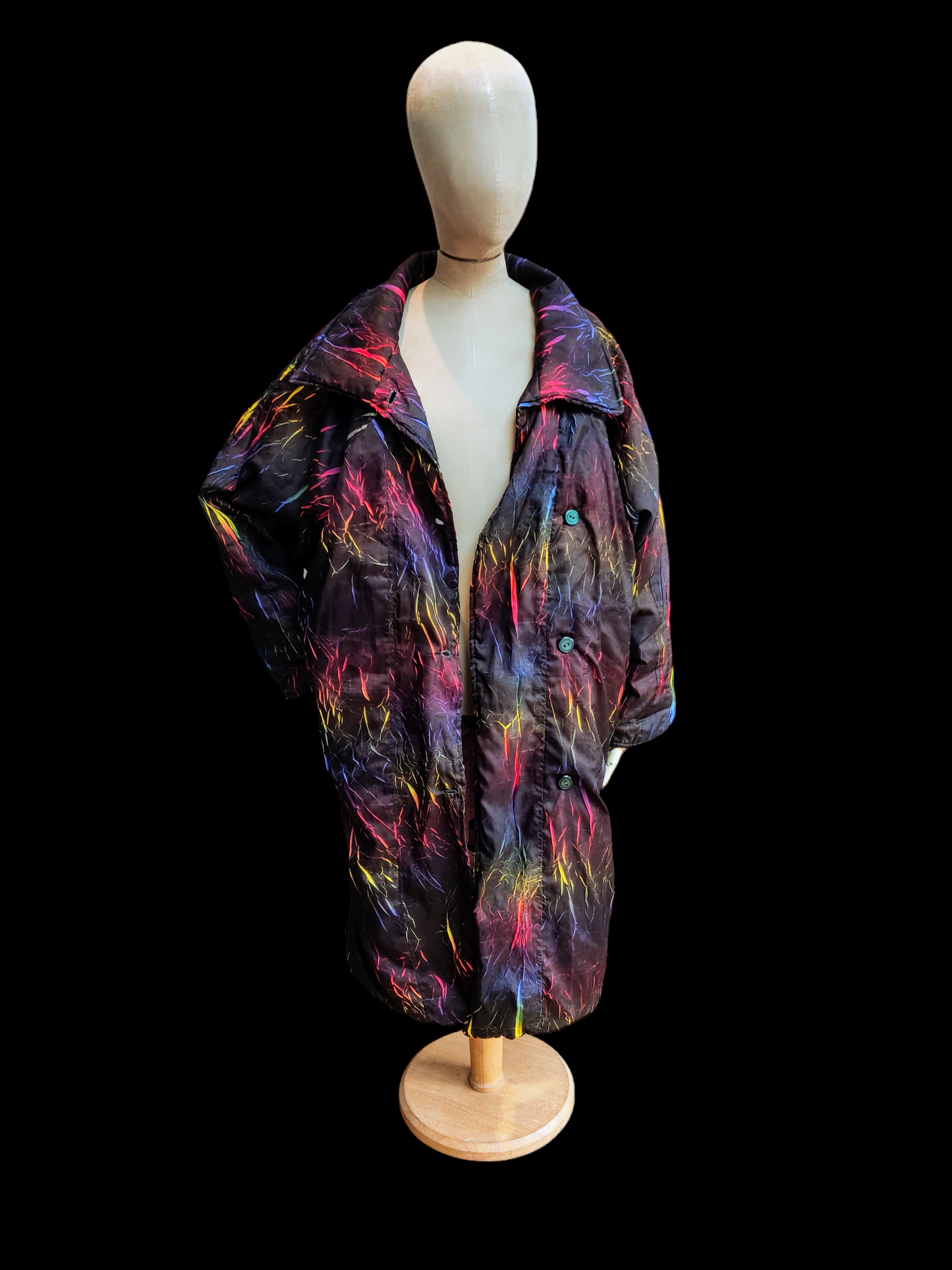 Oversized winter coat in rainbow print.