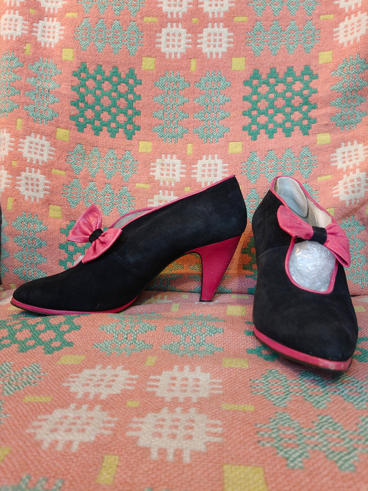 Pink and black 80s heels