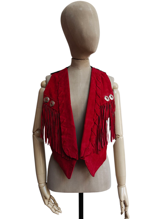 Red fringed vest on a mannequin against a white background