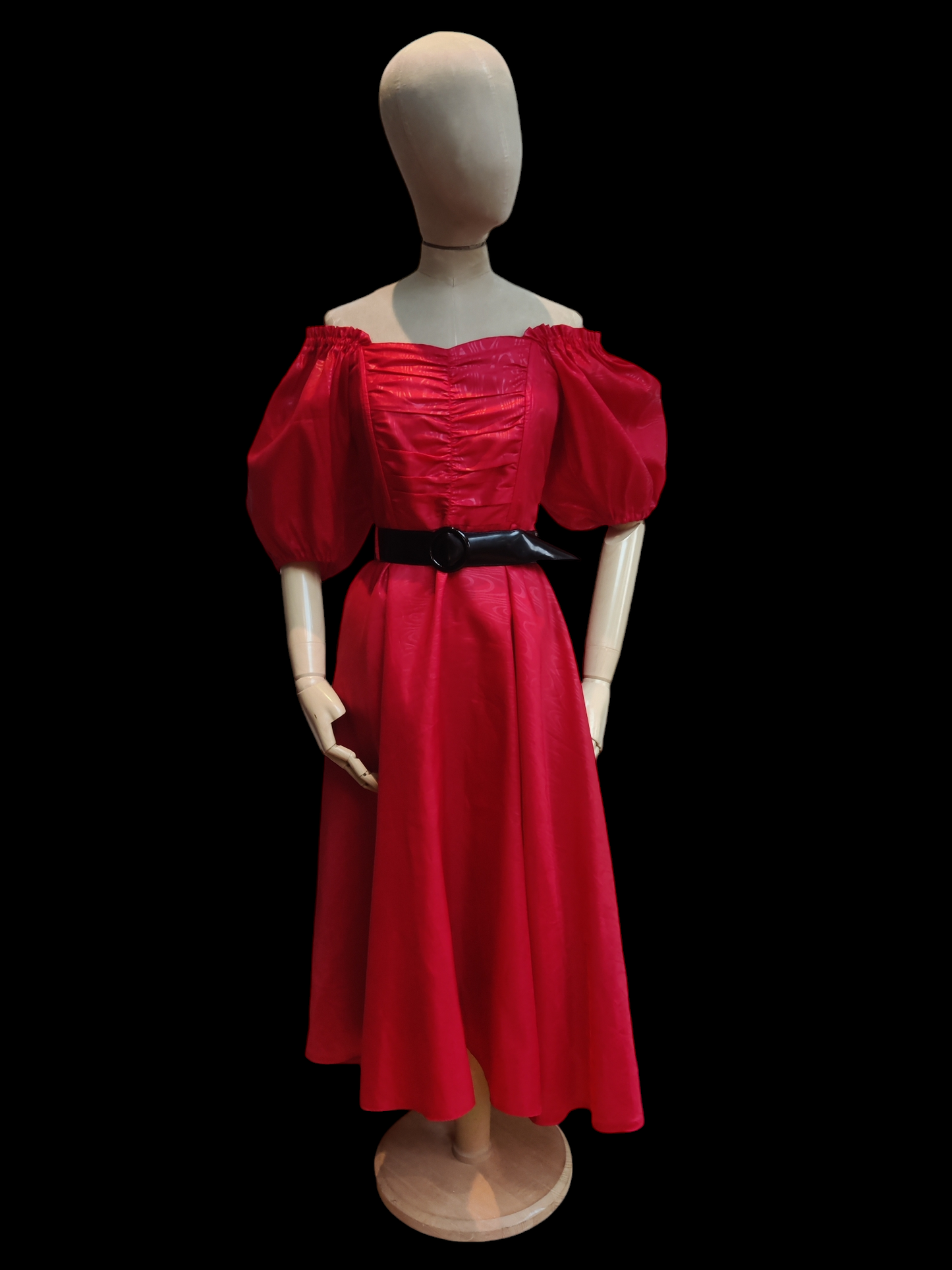 Red flared midi dress with black belt