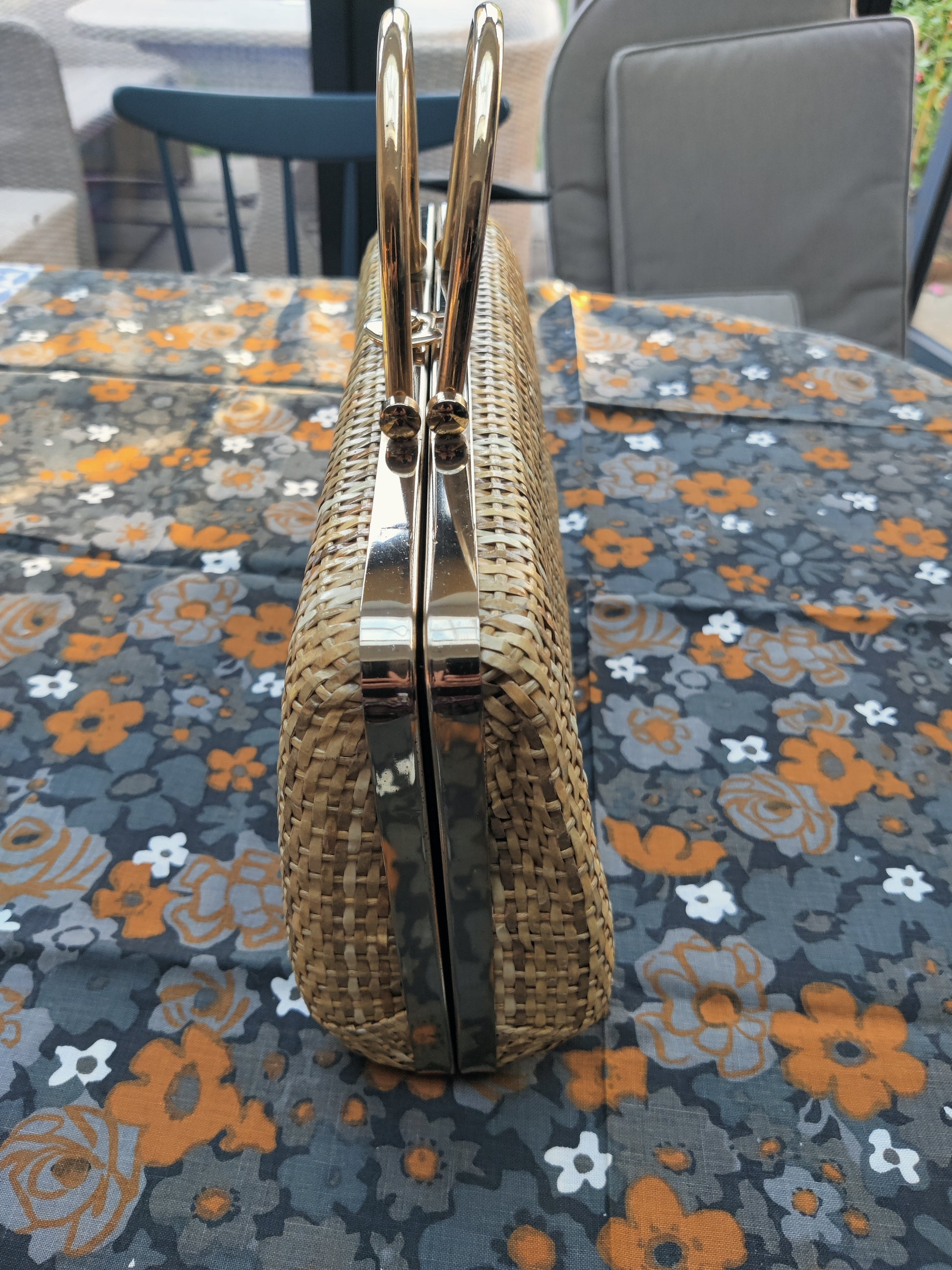 Small rattan case with gold handle