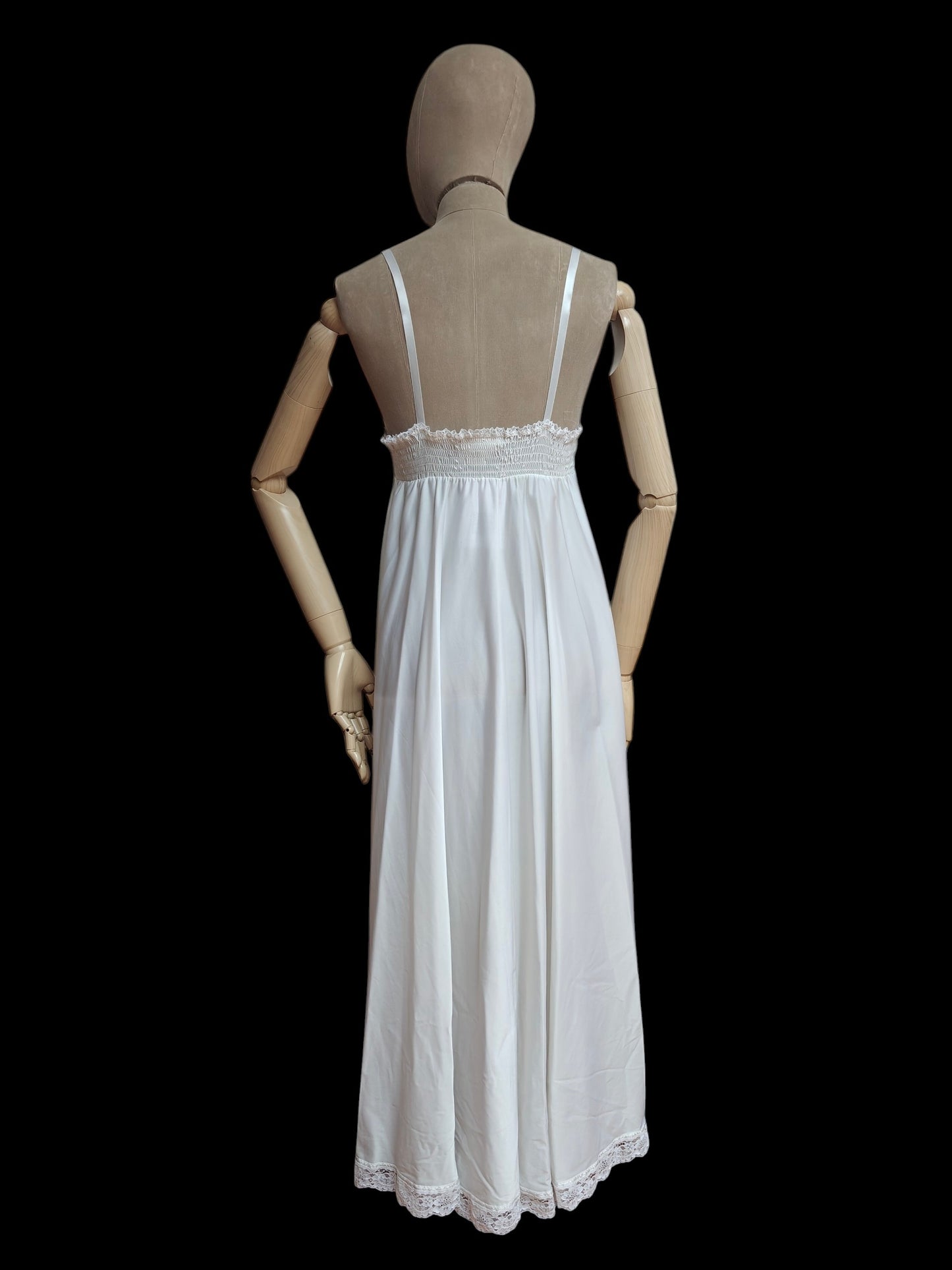 Back of a vintage maxi dress with white lace
