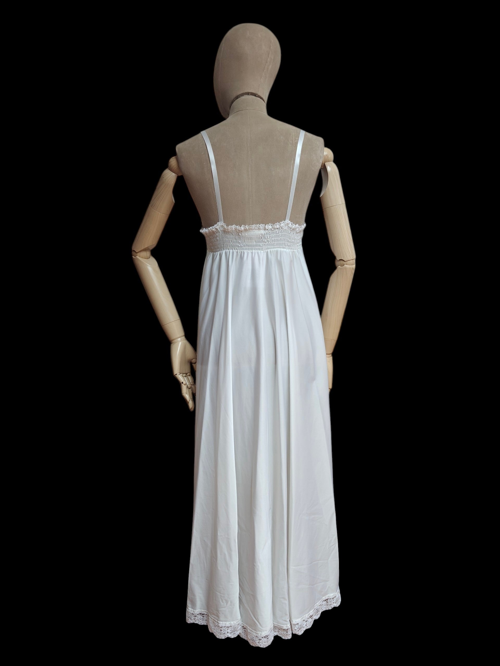 Back of a vintage maxi dress with white lace