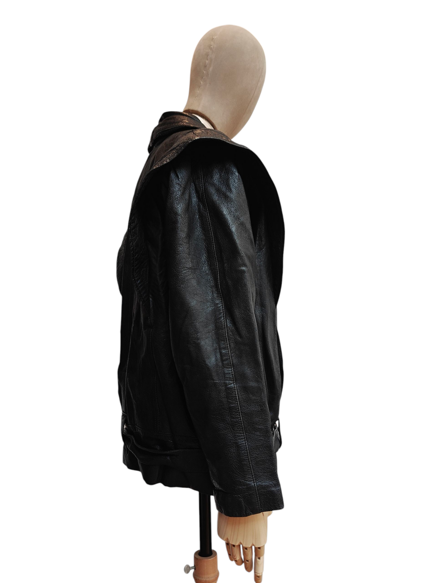 Black leather jacket on a mannequin against a white background