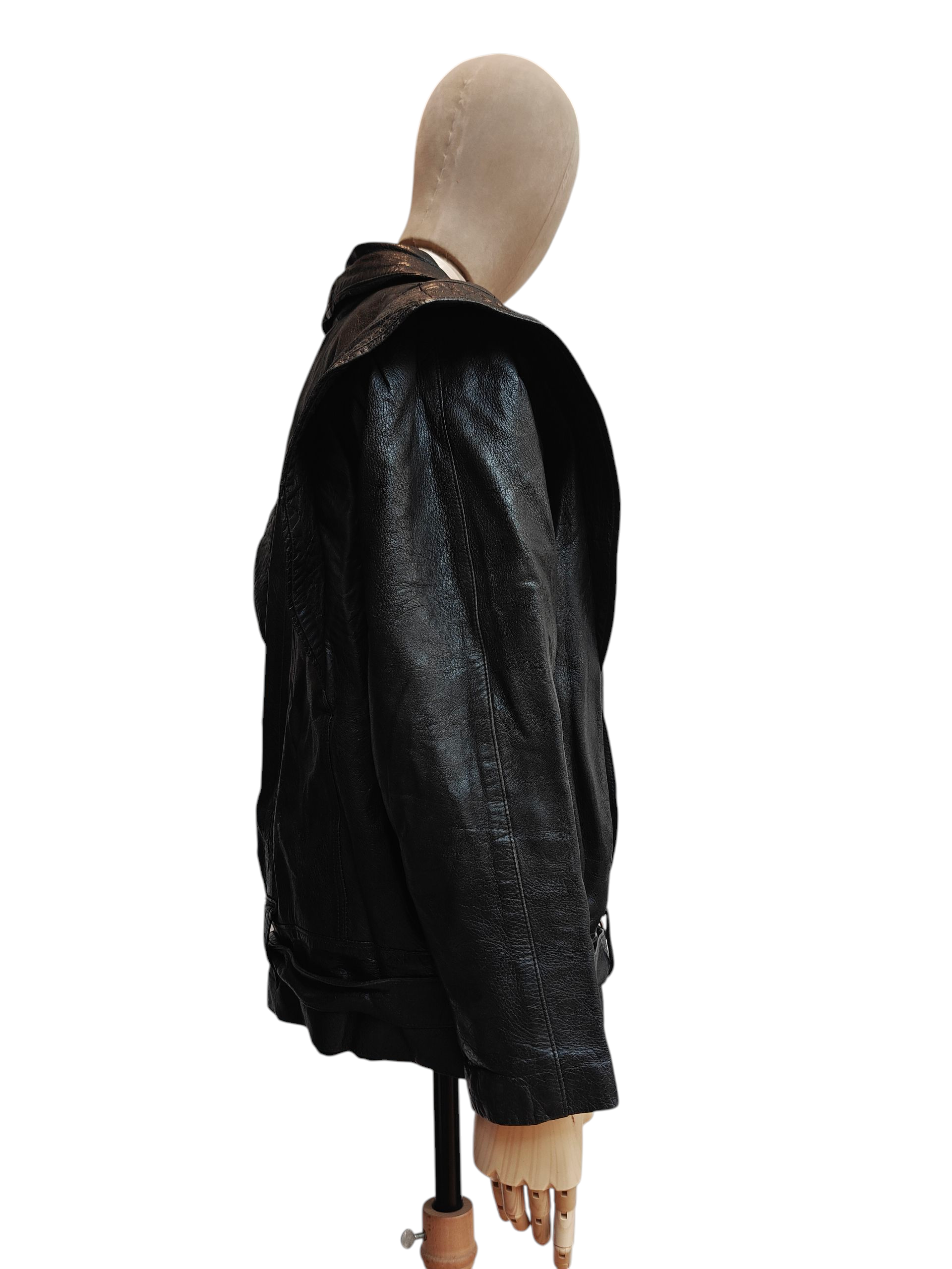 Black leather jacket on a mannequin against a white background
