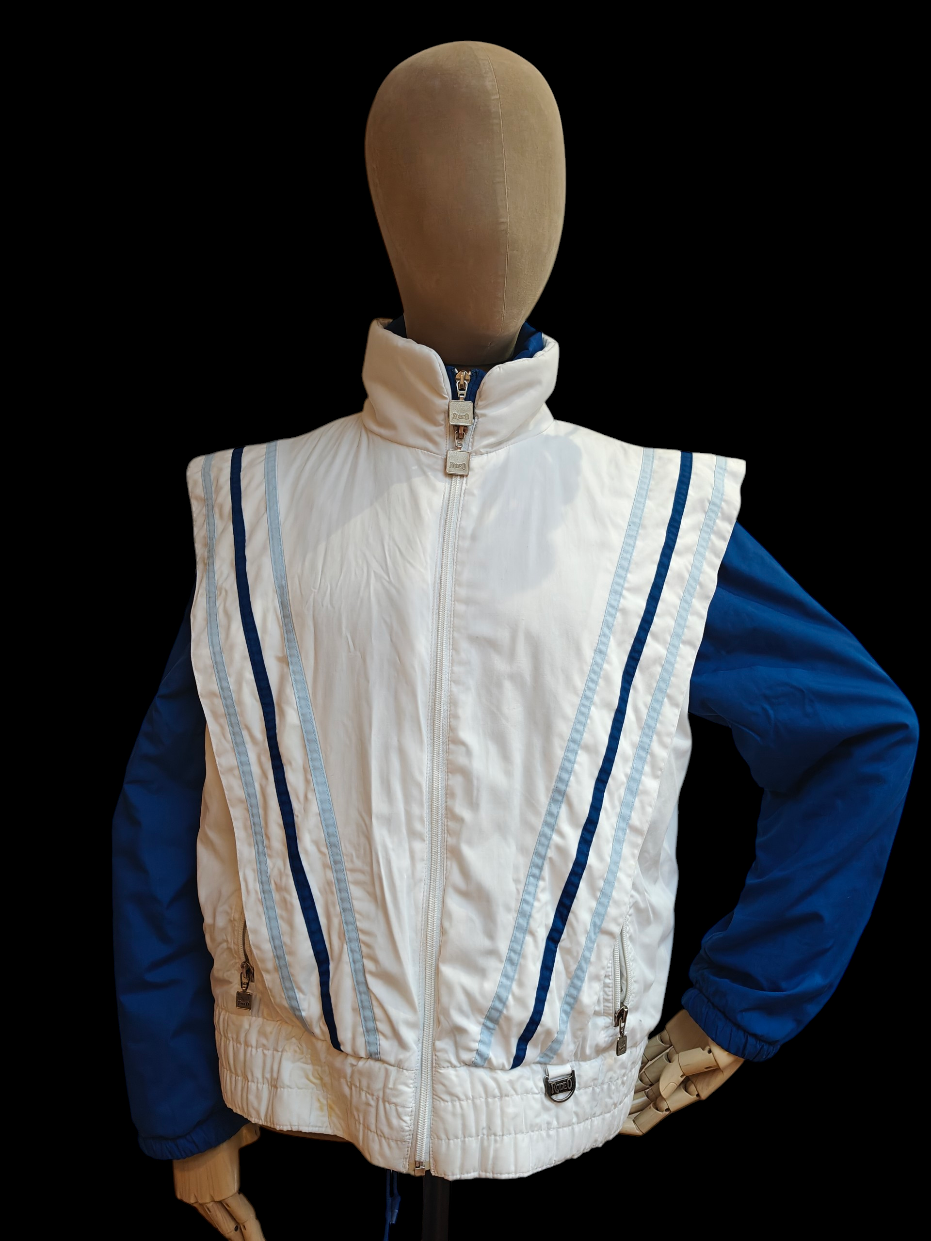 blue and white ski jacket and gilet