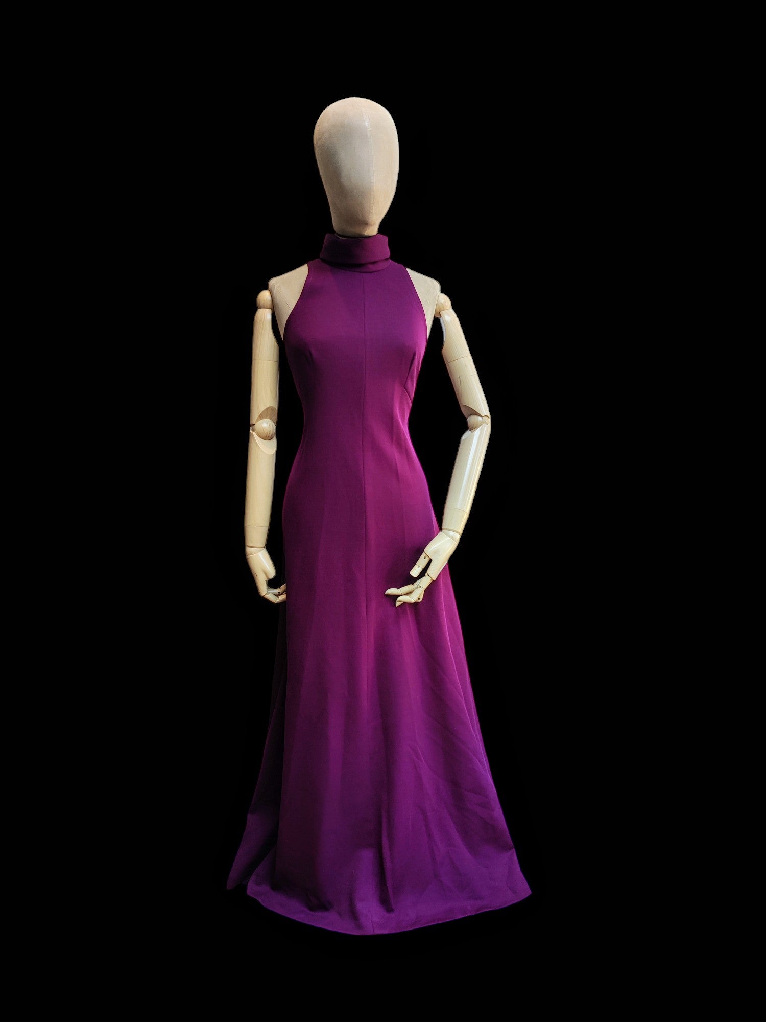 A beautiful sleeveless 70s maxi dress in deep purple.