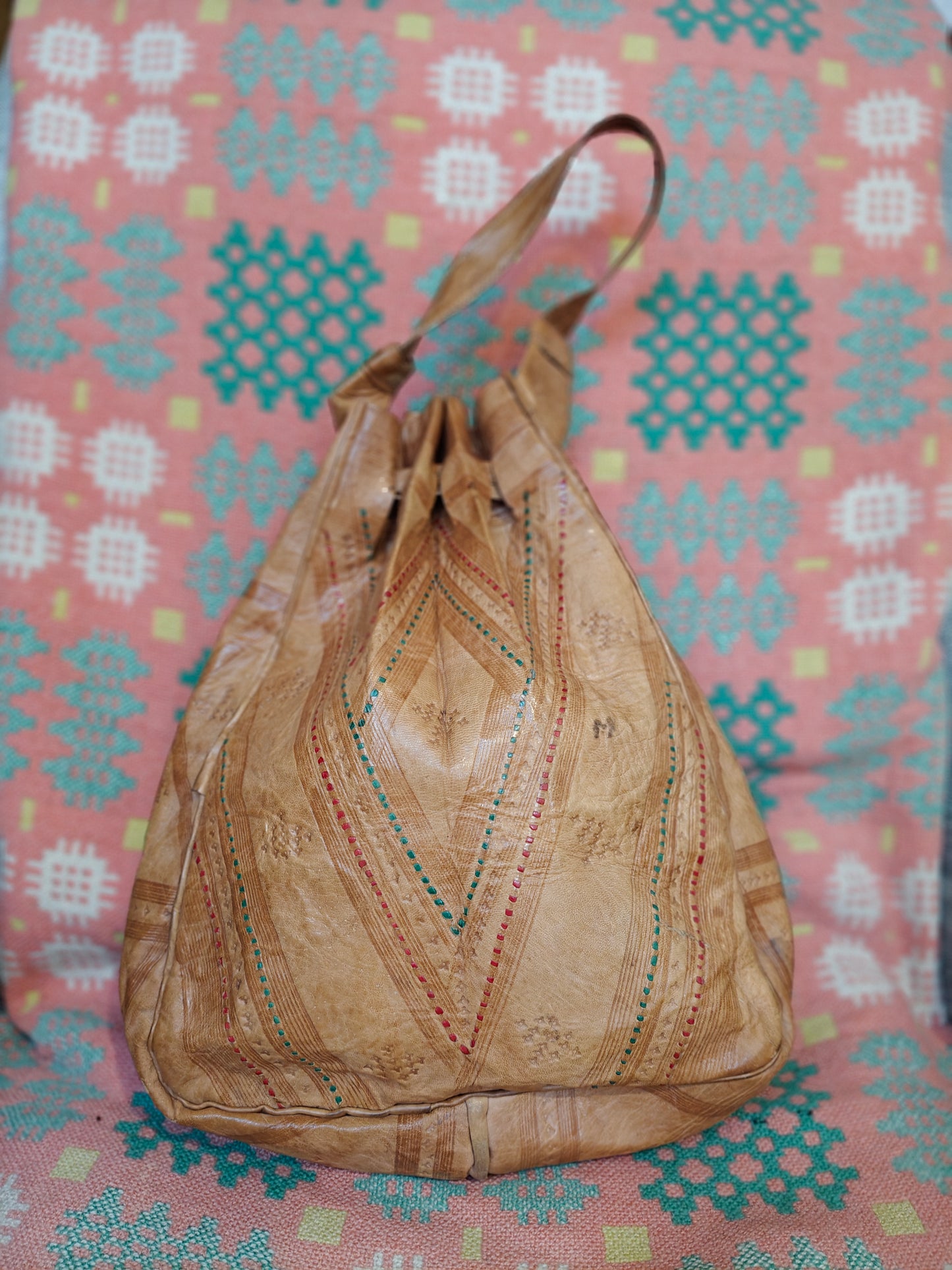 Vintage boho tooled leather duffle bag