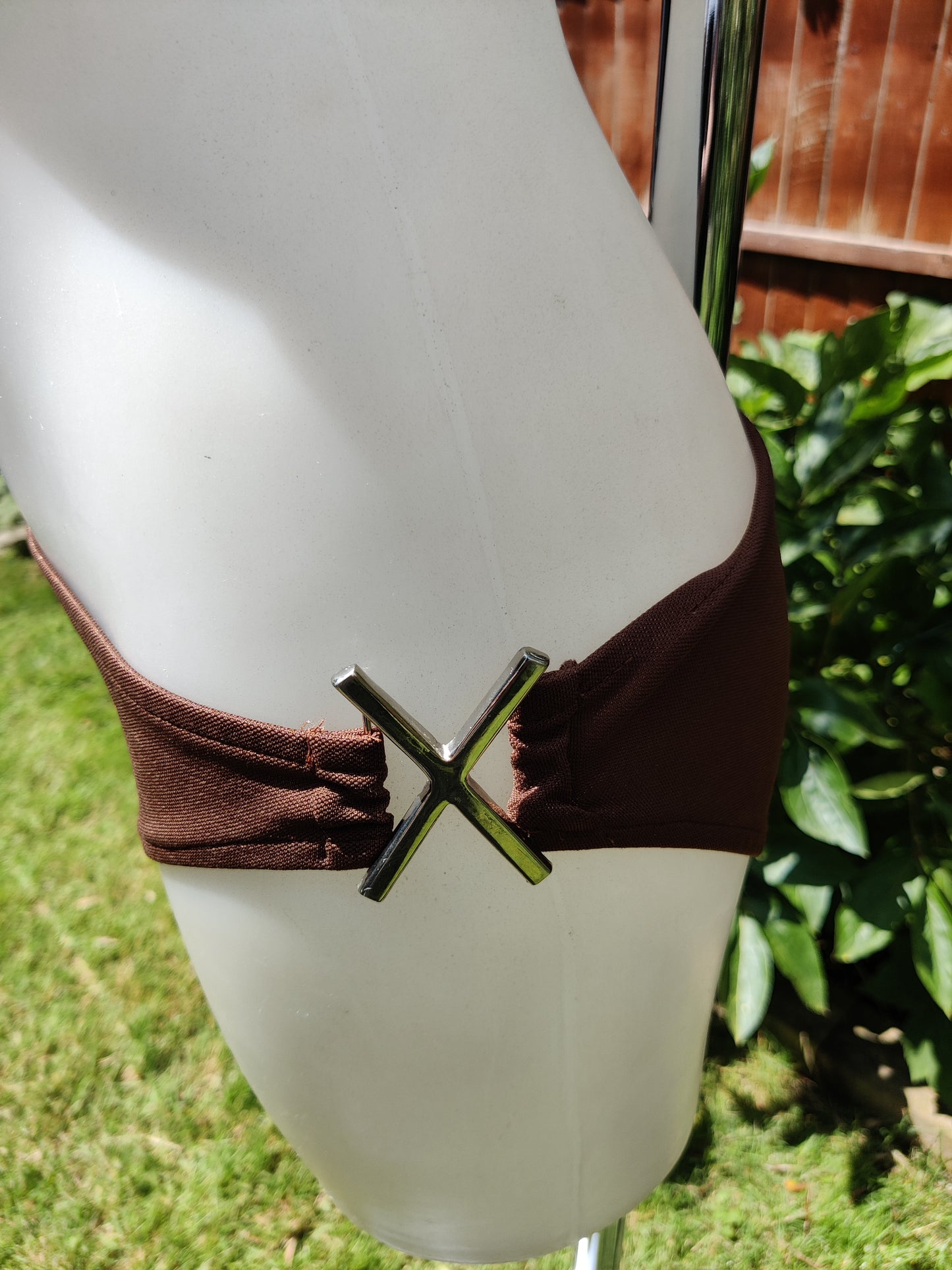 Brown bikini bottoms with metal buckle sides