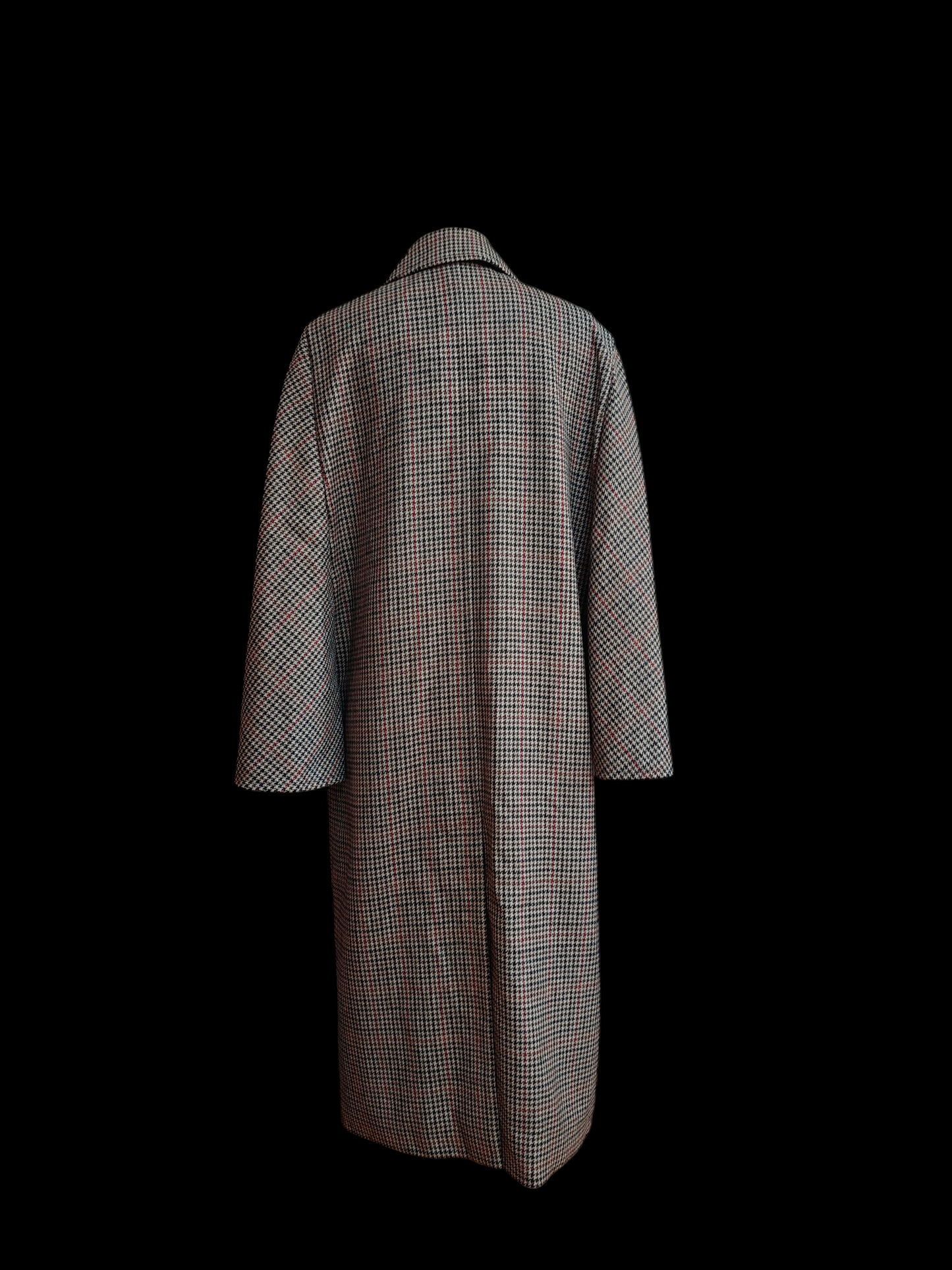 Long checkered coat on a black background