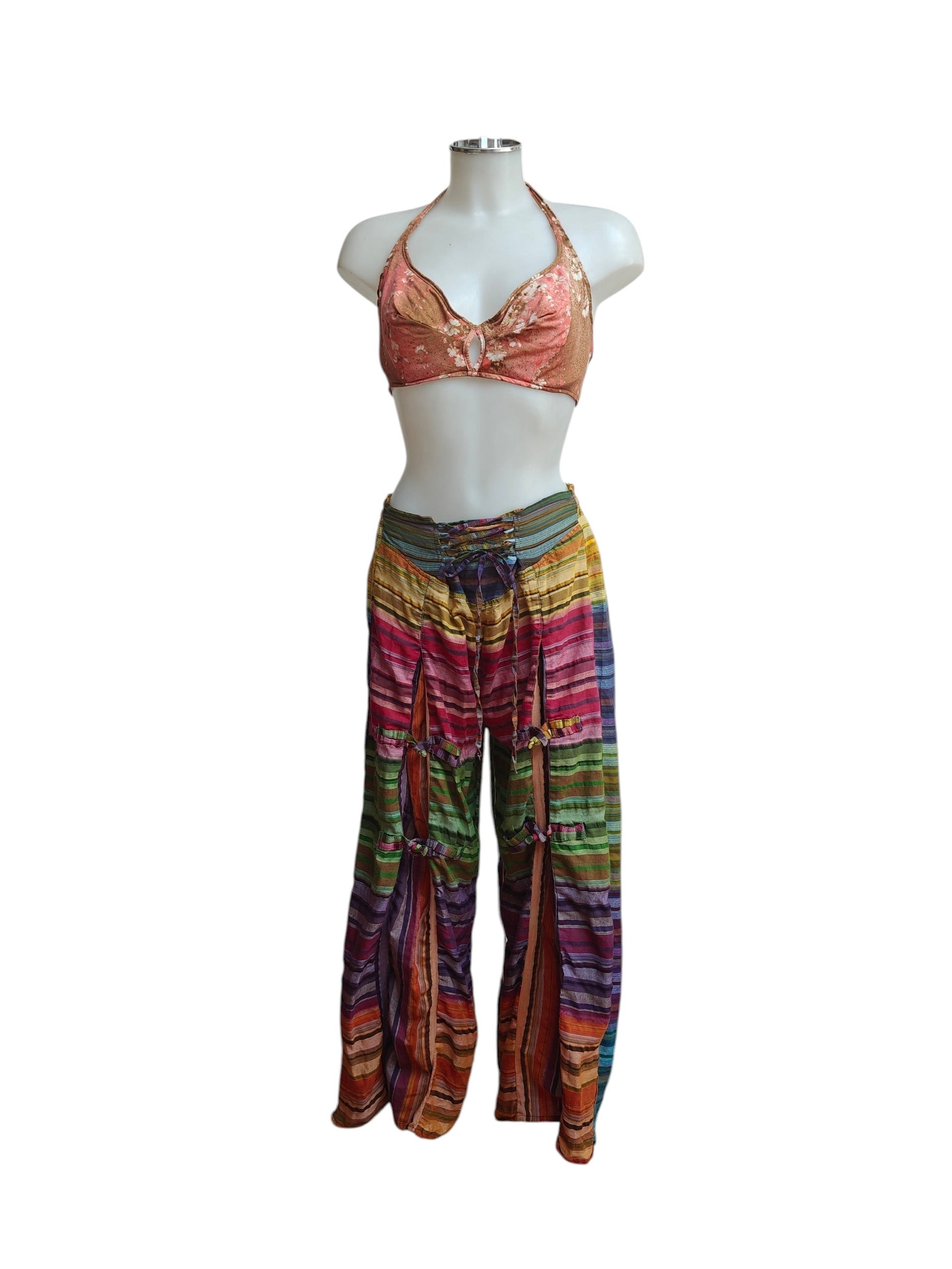 Colourful harem pants and top set on a mannequin against a white background