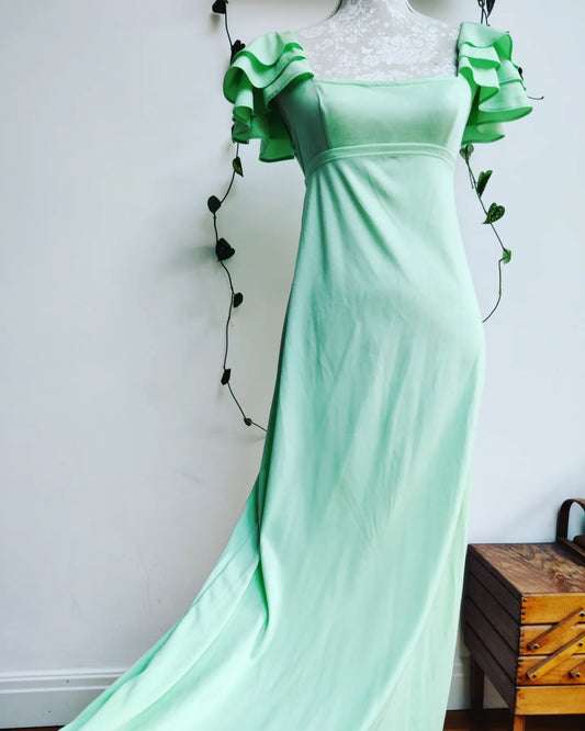 Beautiful vintage mint green maxi dress with ruffle frill sleeves. Size 8.