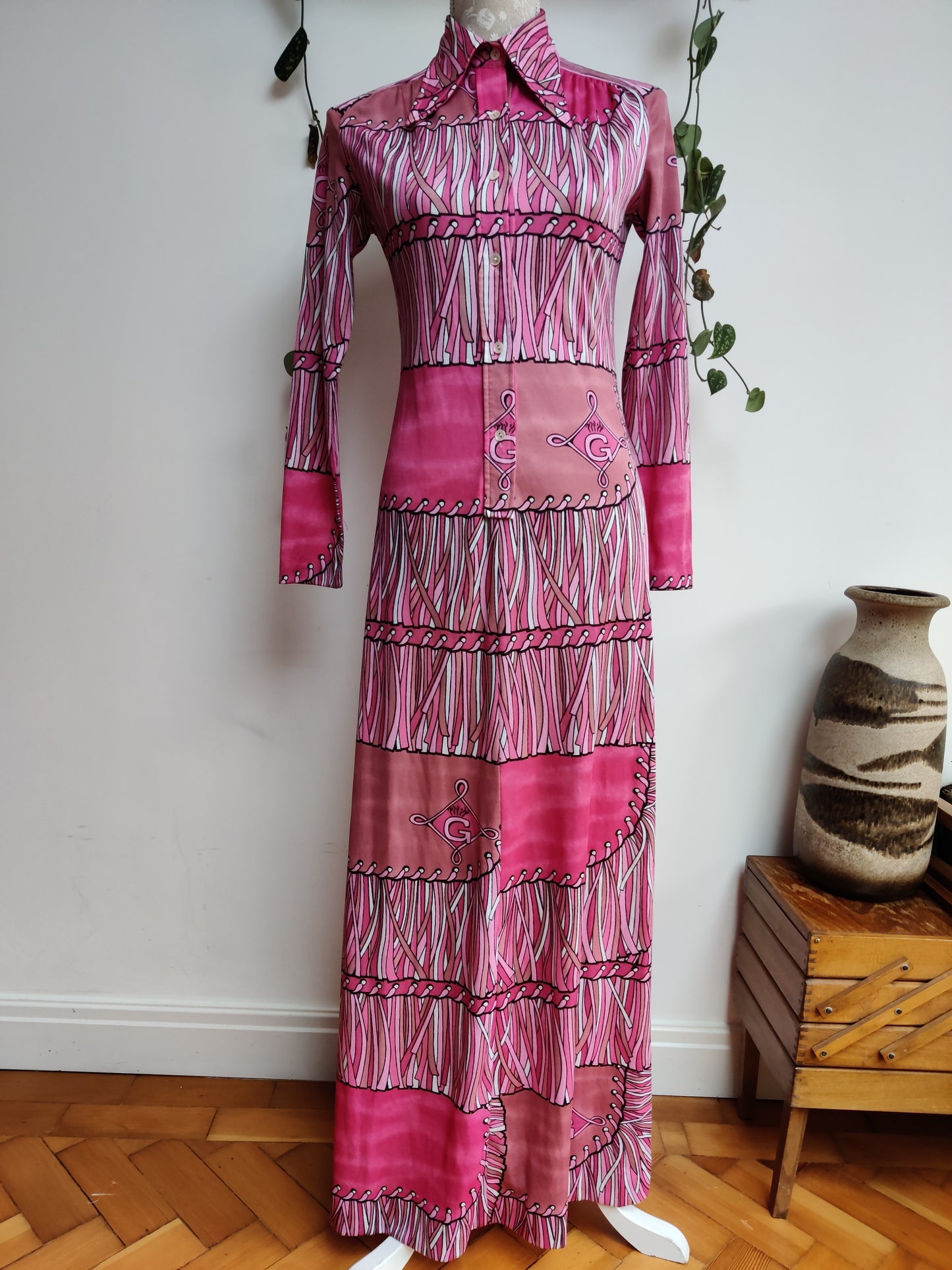 vintage 70s dress in pink psychedelic print.