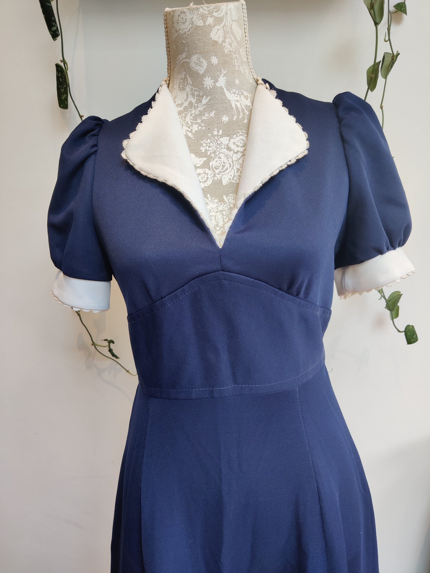 navy vintage dress with puff sleeves